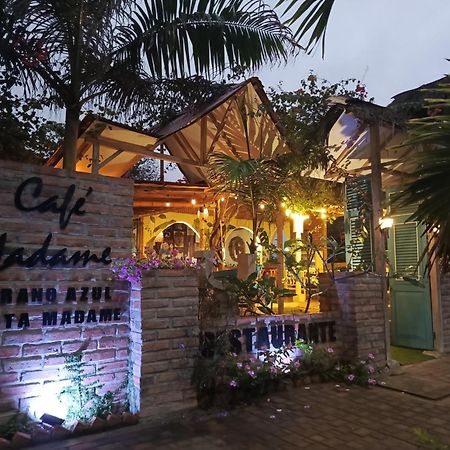 Cafe Madame Hotel ปูแอร์โตโลเปซ ภายนอก รูปภาพ