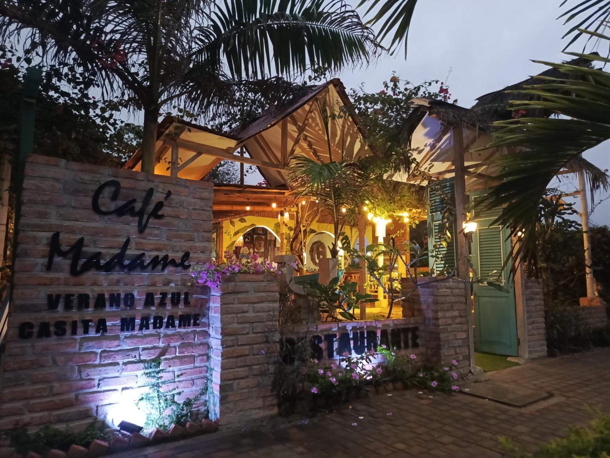 Cafe Madame Hotel ปูแอร์โตโลเปซ ภายนอก รูปภาพ